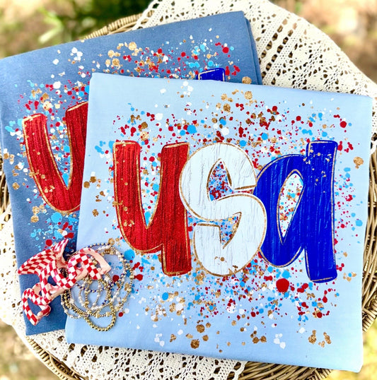 USA Splatter Graphic Tee – Patriotic Red White Blue Shirt